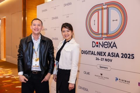 Attendees at the Digital:Nex Asia 2025 backdrop