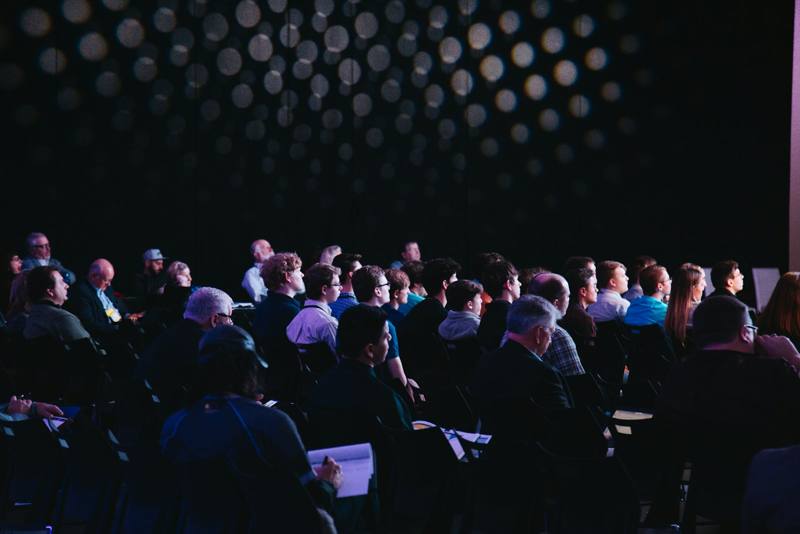 Audience at a D:NEXA technology conference